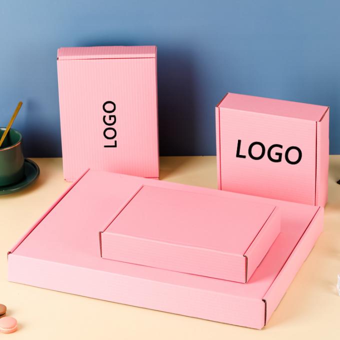 Op maat gemaakte kleding die cut mailer papieren doos gegolfde verpakking roze verzenddozen 10